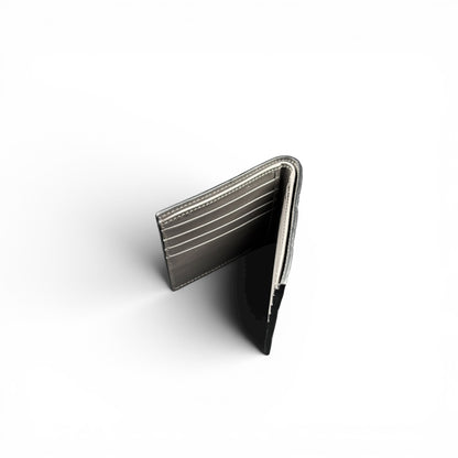 GUCCI GG EMBOSSED LEATHER WALLET